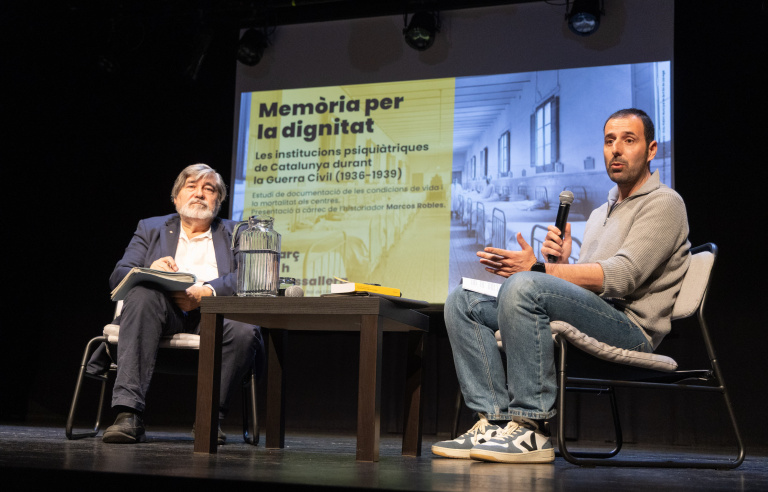 L'historiador Marcos Robles, amb el representant de la Generalitat de Catalunya